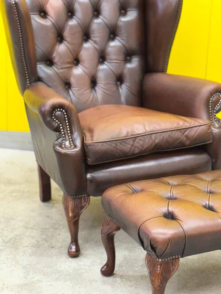 Dark Brown leather chesterfield wing chair with Ottoman