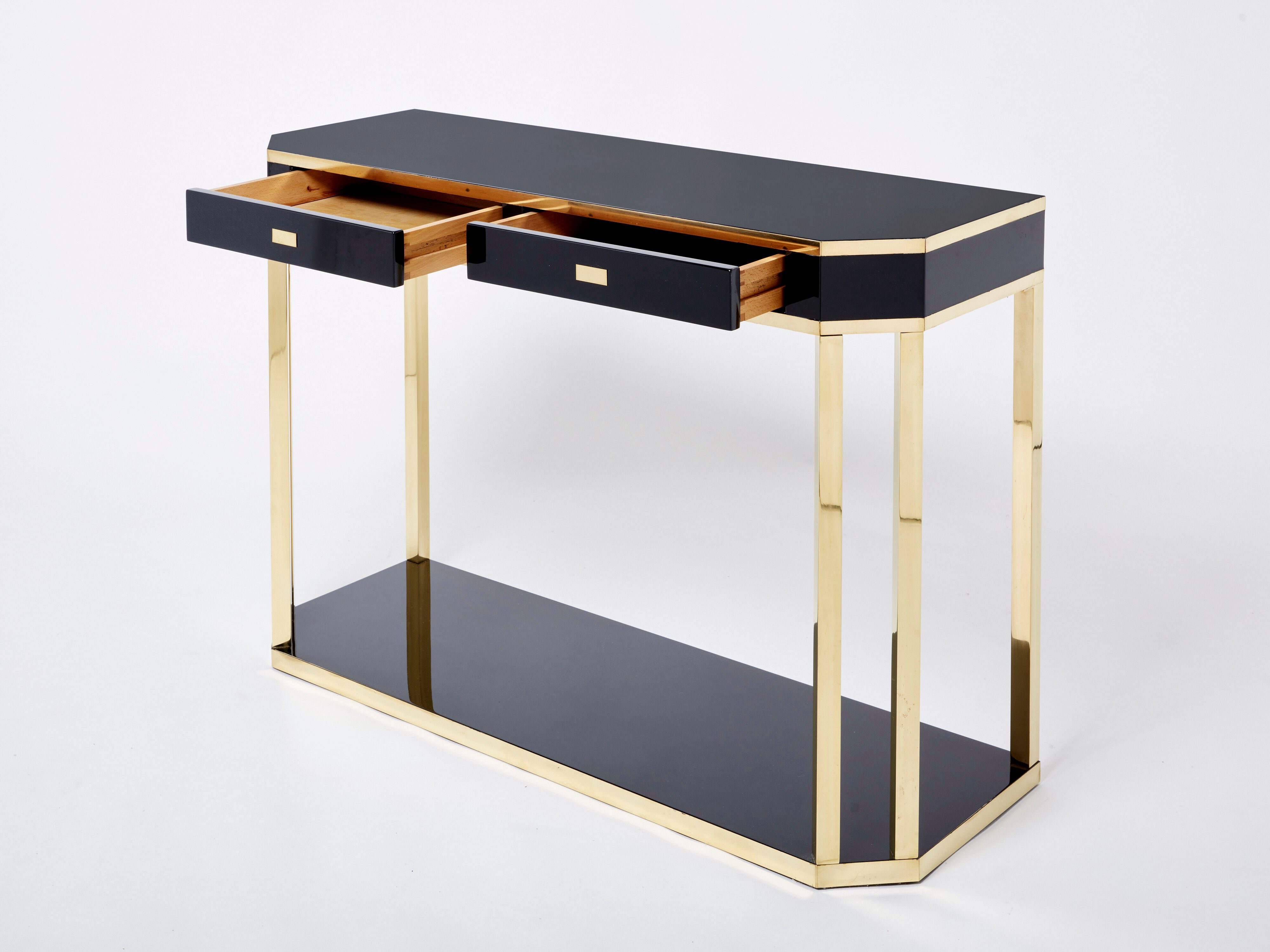 Pair of black lacquered consoles and brass 1970