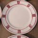 Eight Badonviller dinner plates