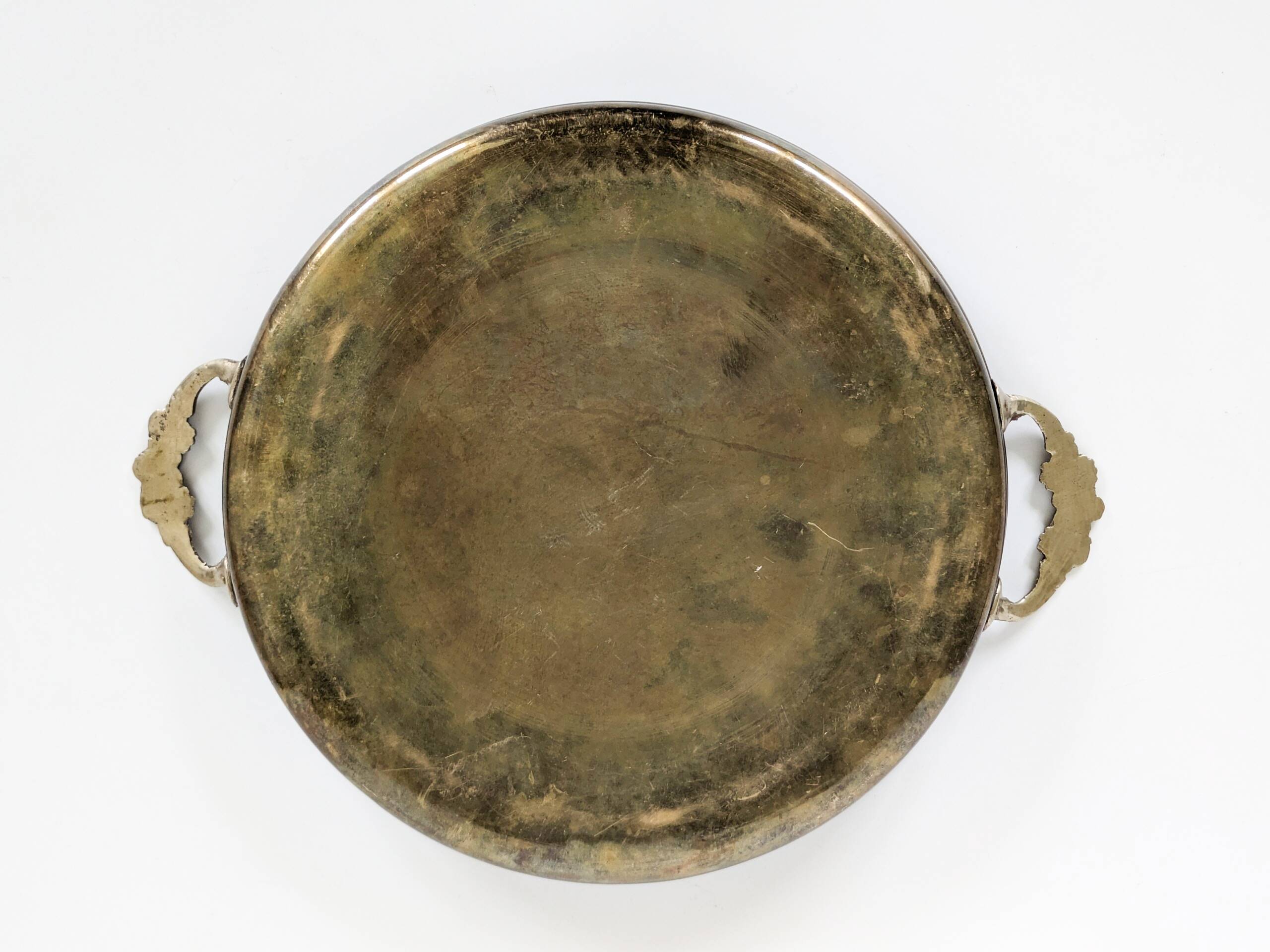 Vintage decorative brass tray, pierced edge and floral handles.