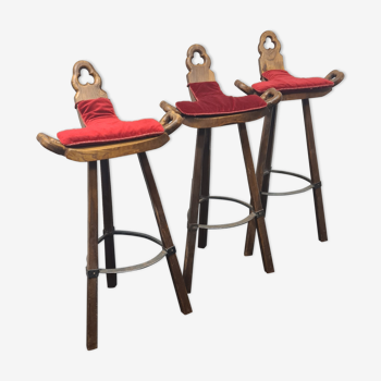 Three vintage Spanish bar stools