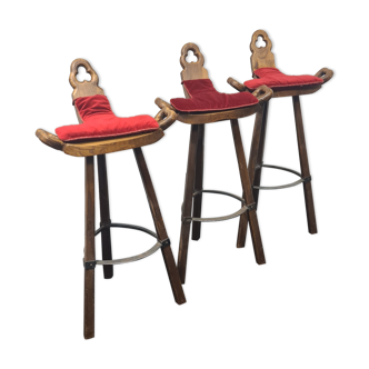 Three vintage Spanish bar stools