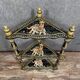 India circa 1900: attractive corner shelf in lacquered and painted wood