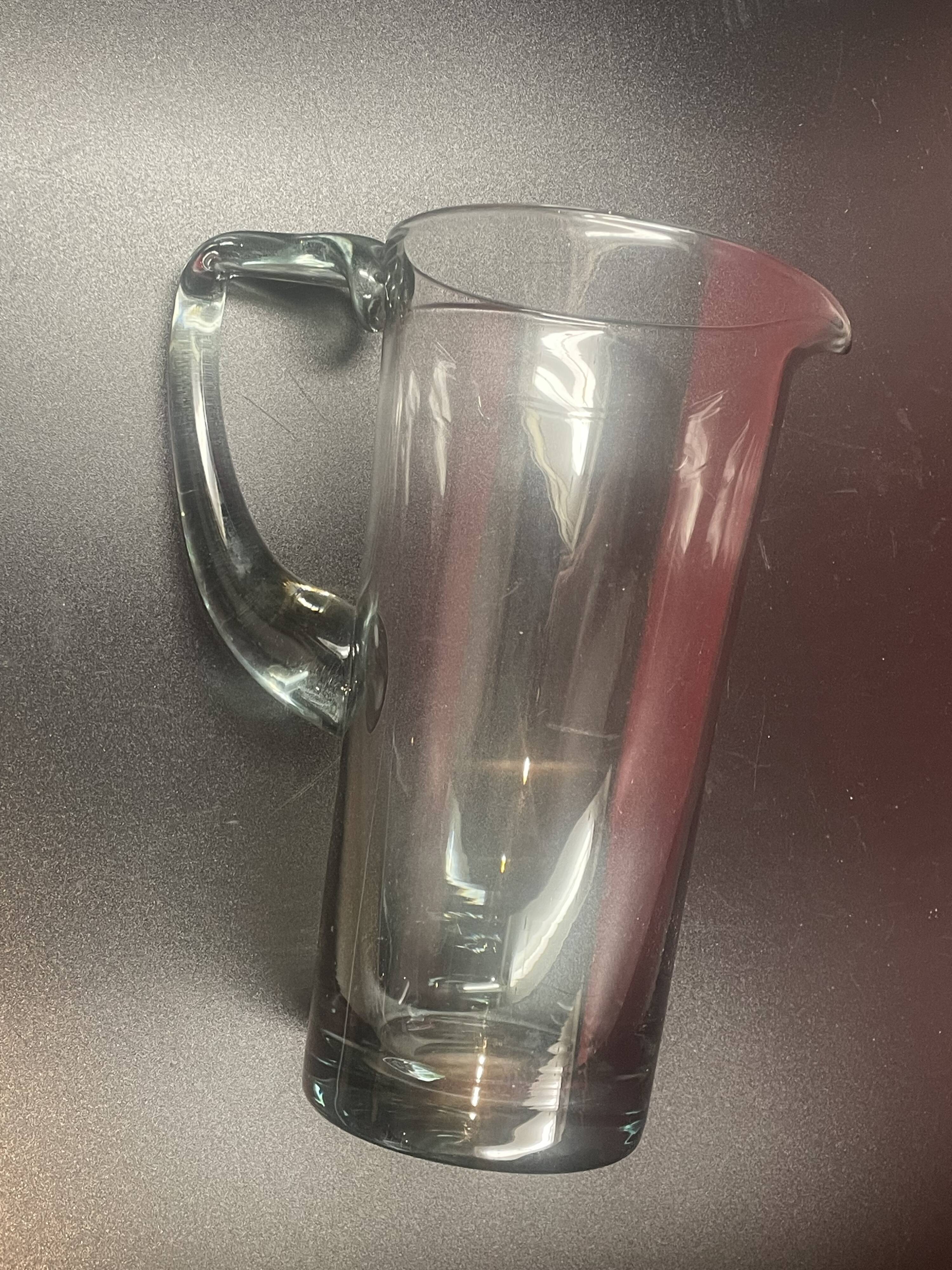 elegant water or orangeade pitcher in smoked glass from the 1970s - 25 cm