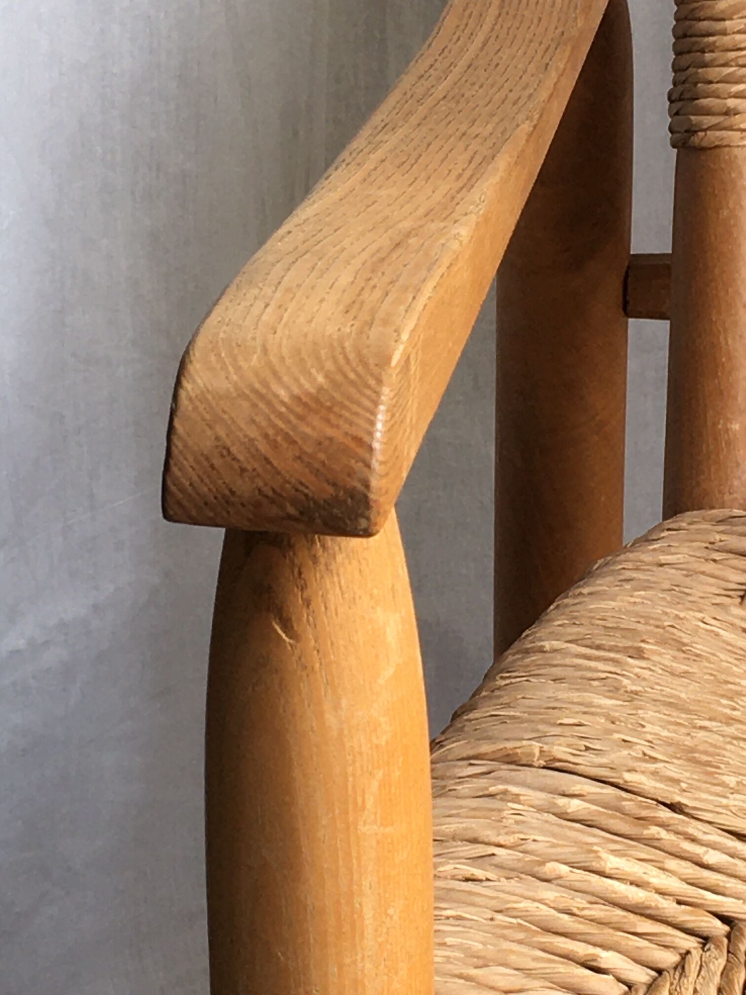 "Paillé" armchair by Charlotte Perriand