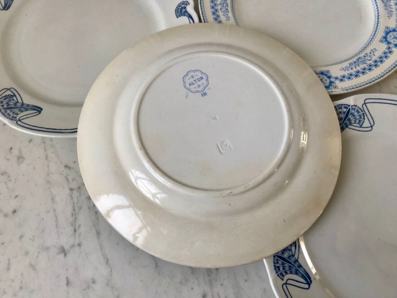 Lot of 4 mismatched flat plates terre de fer "alton" late nineteenth