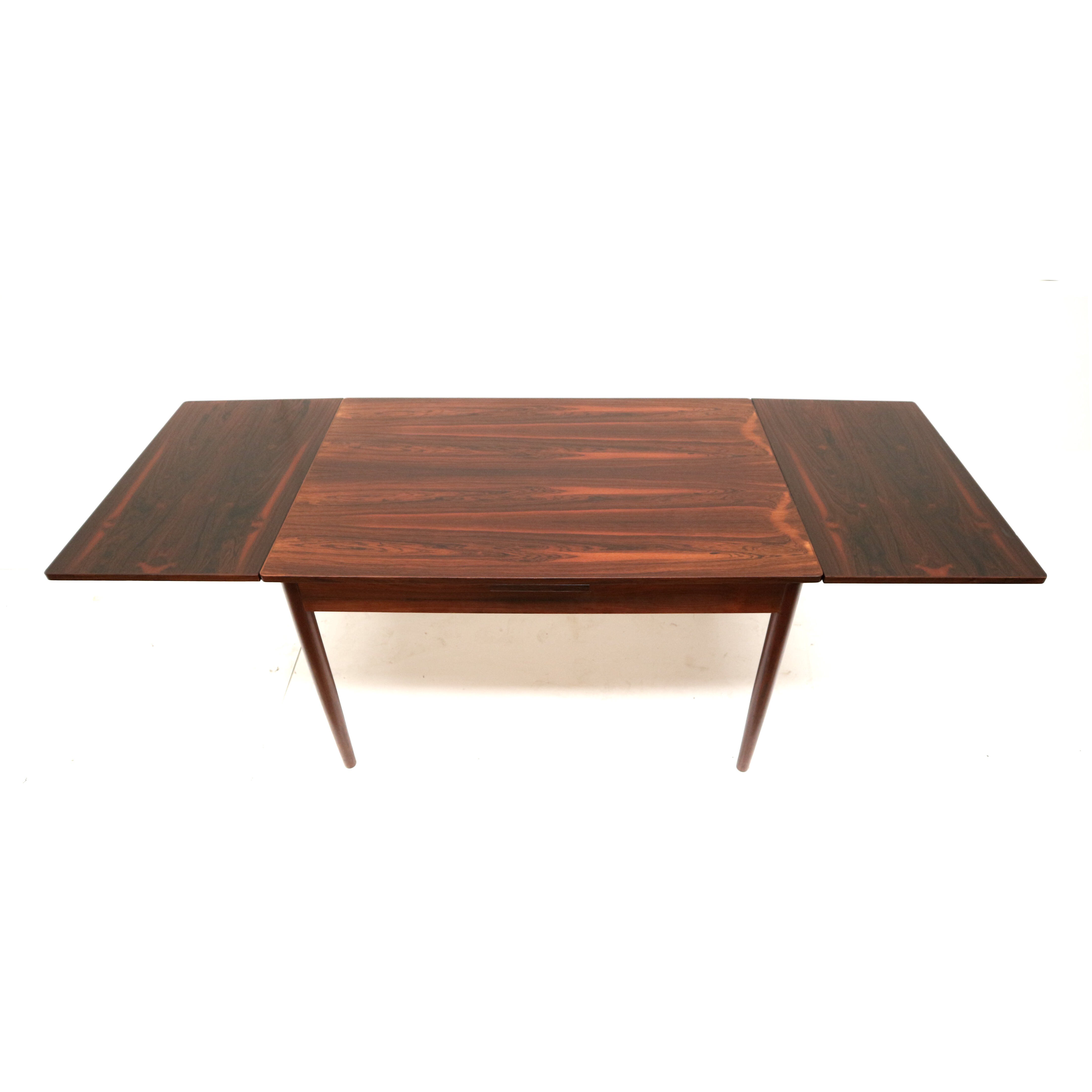 Vintage extendable rosewood dining table made in the 60s