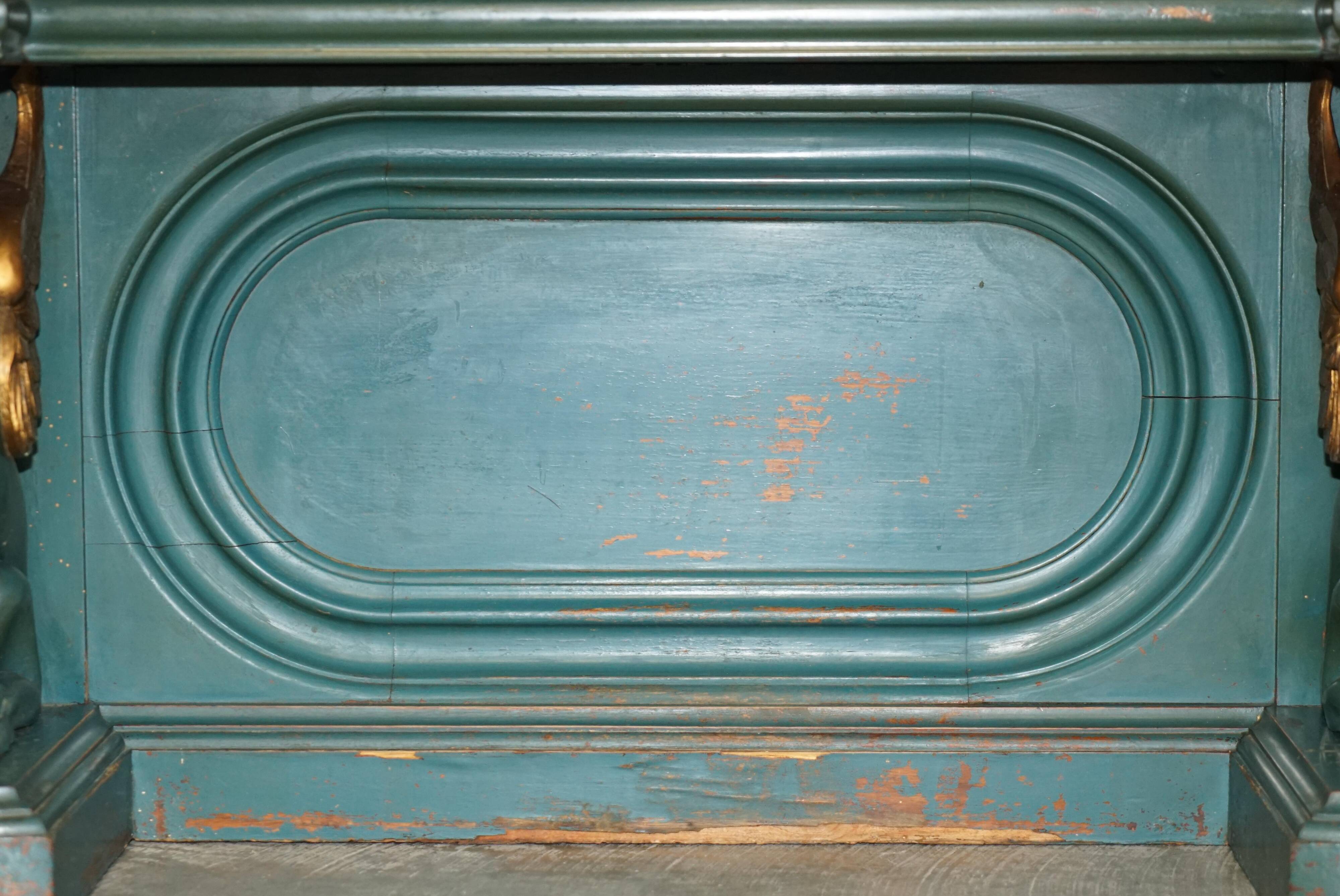 Antique hand-carved console circa 1880 with a marble top.