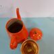 Orange enamelled sheet maker