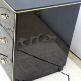 Lacquered black chest of drawers, golden brass