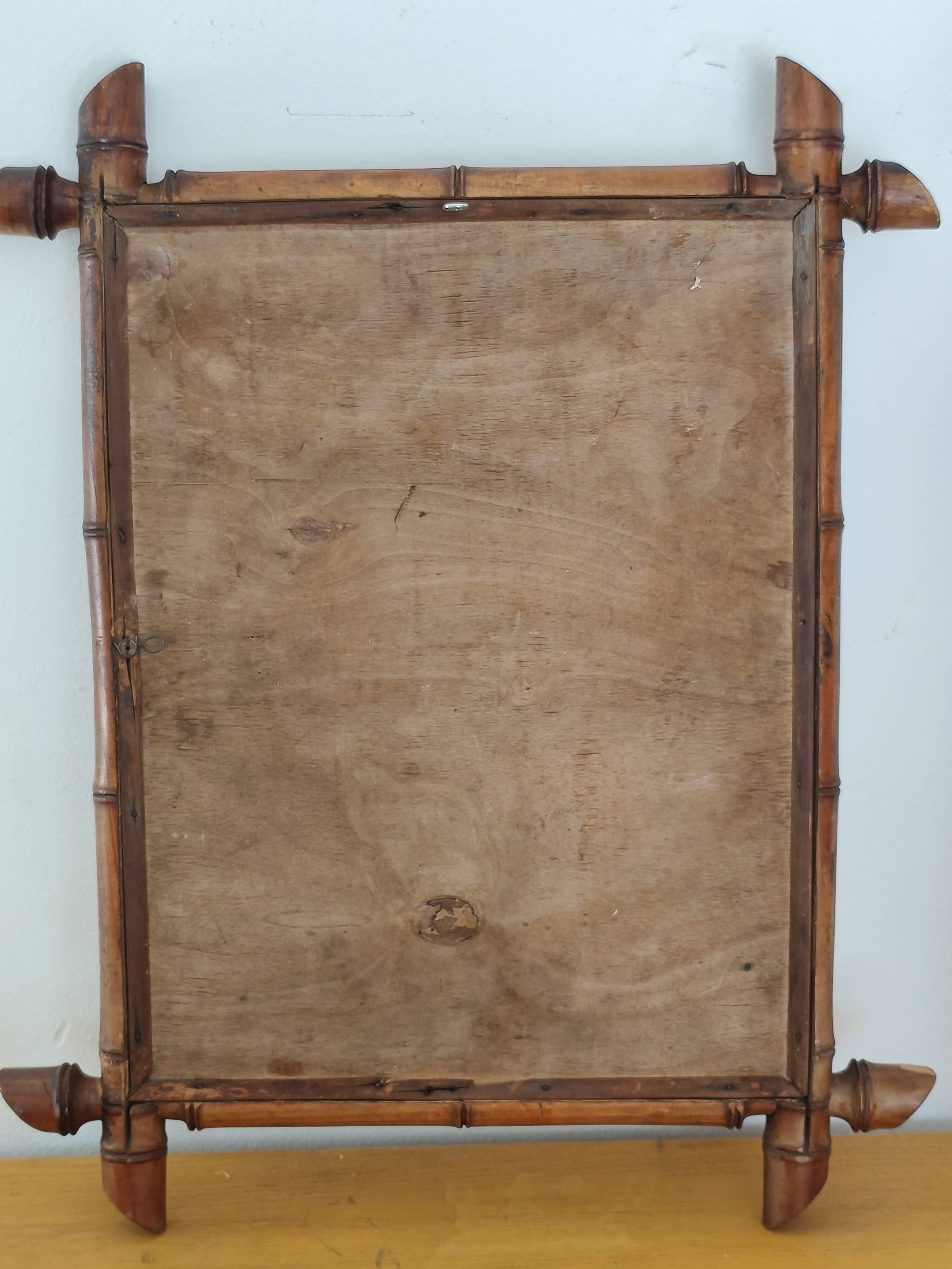 Petit miroir en bambou ancien