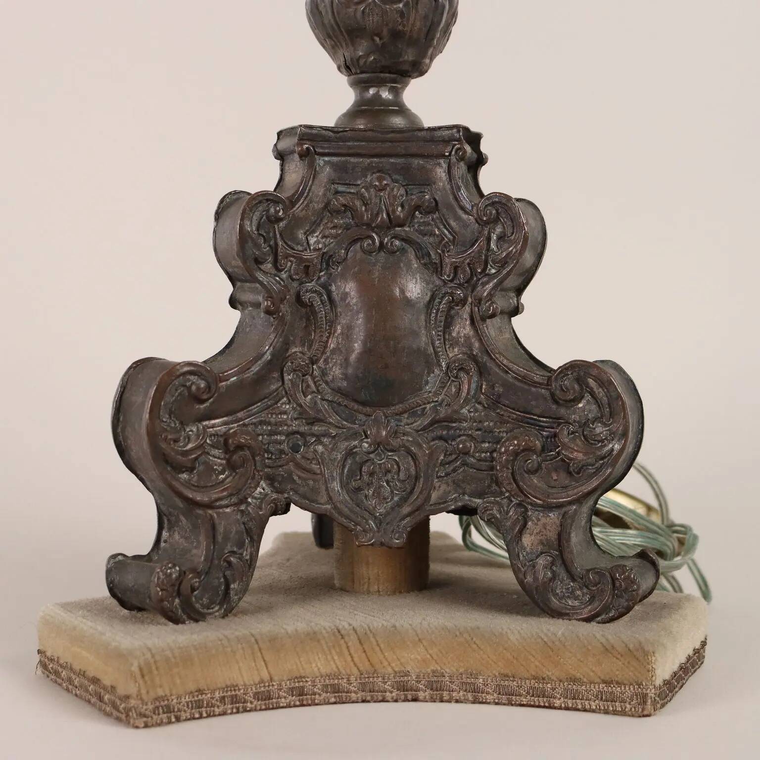 Antique candelabrum converted into a lamp, 18th-19th century.