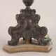 Antique candelabrum converted into a lamp, 18th-19th century.