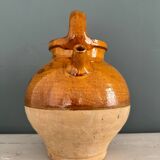 Old terracotta gargoulette jug