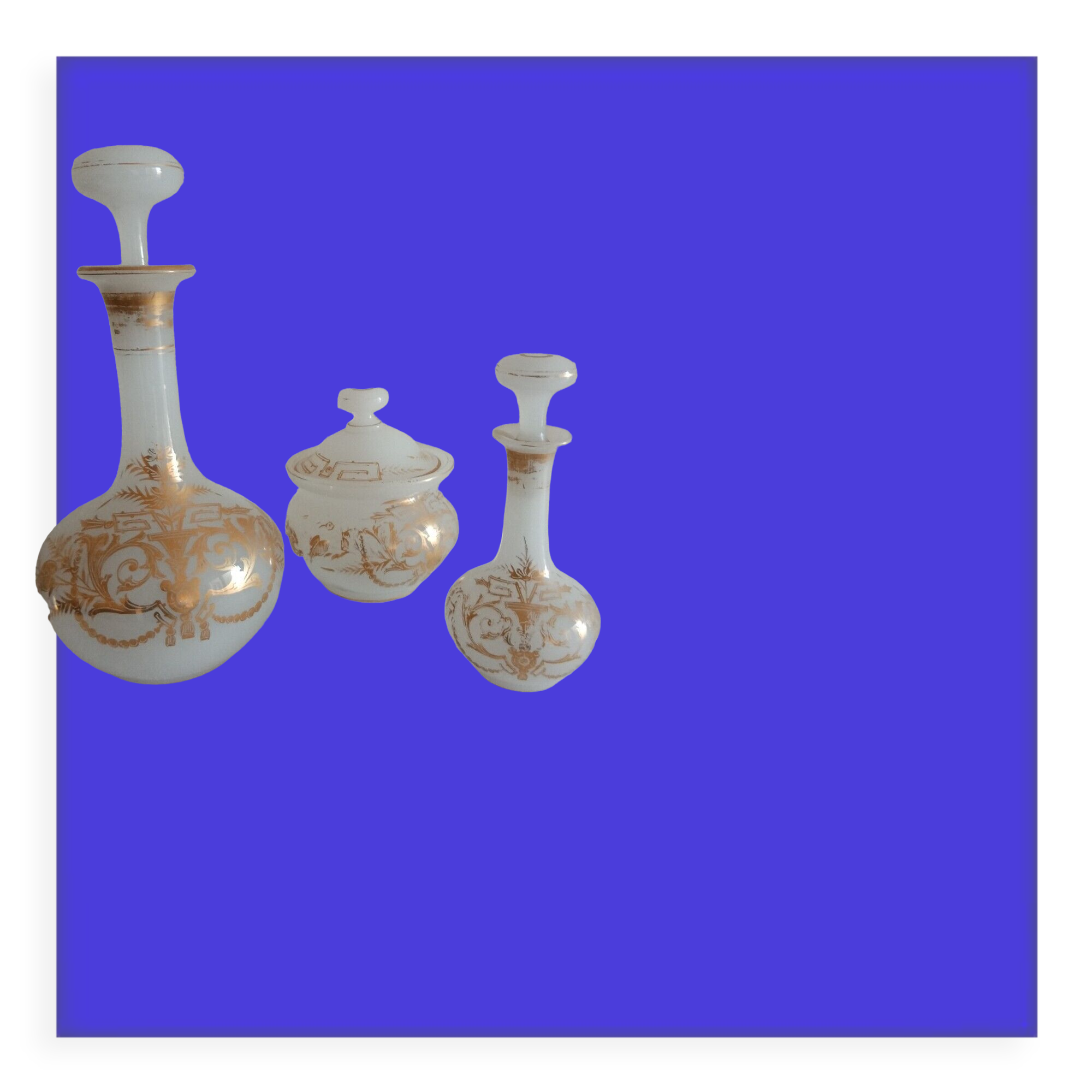 Suite Carafe, Carafon and Pot Opaline with gilded decorations XIX th