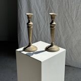 Pair of classic candlesticks in patinated gold metal H25