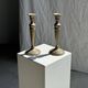 Pair of classic candlesticks in patinated gold metal H25