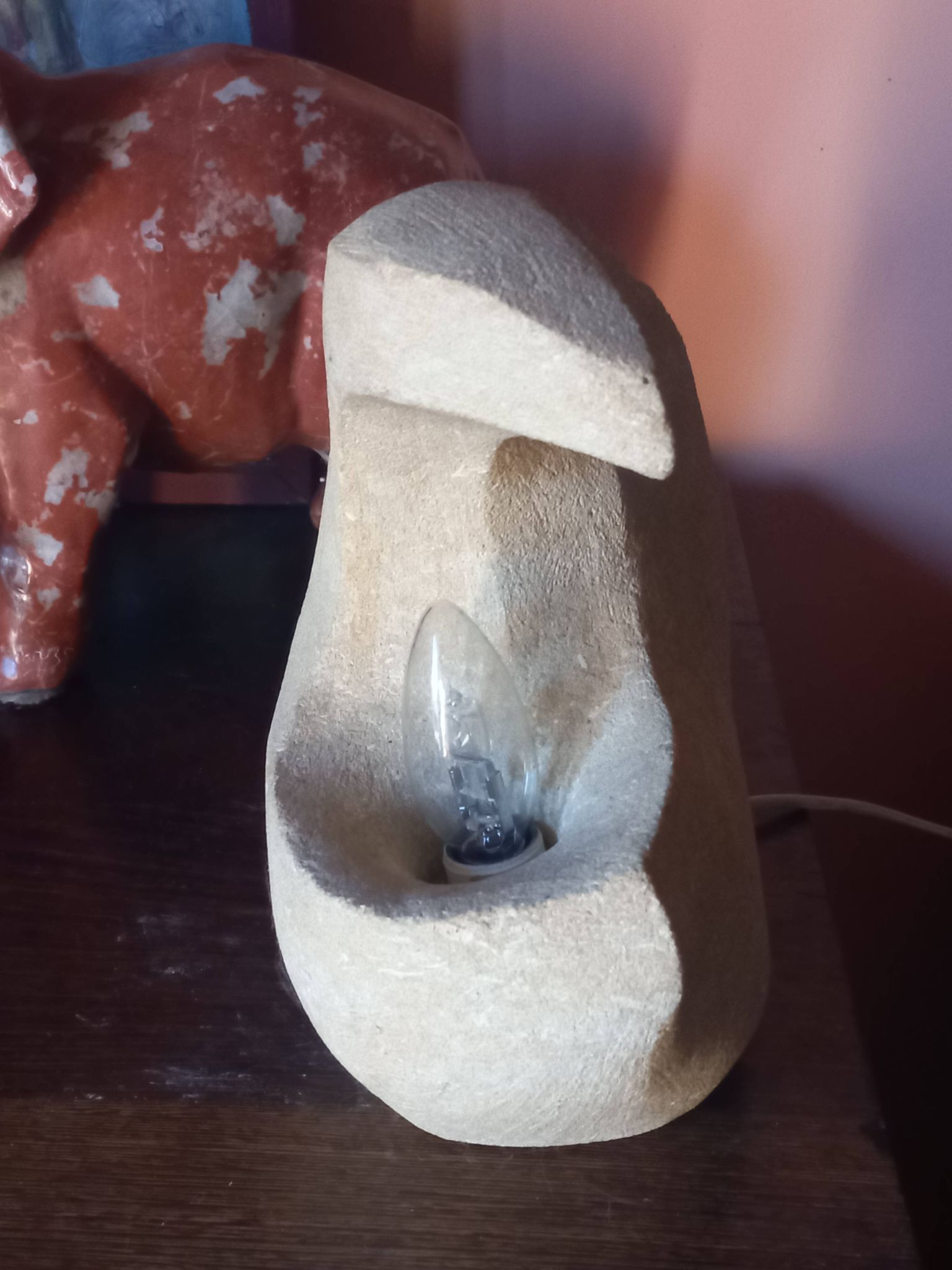 Sculpted stone lamp from the 1970s, signed.