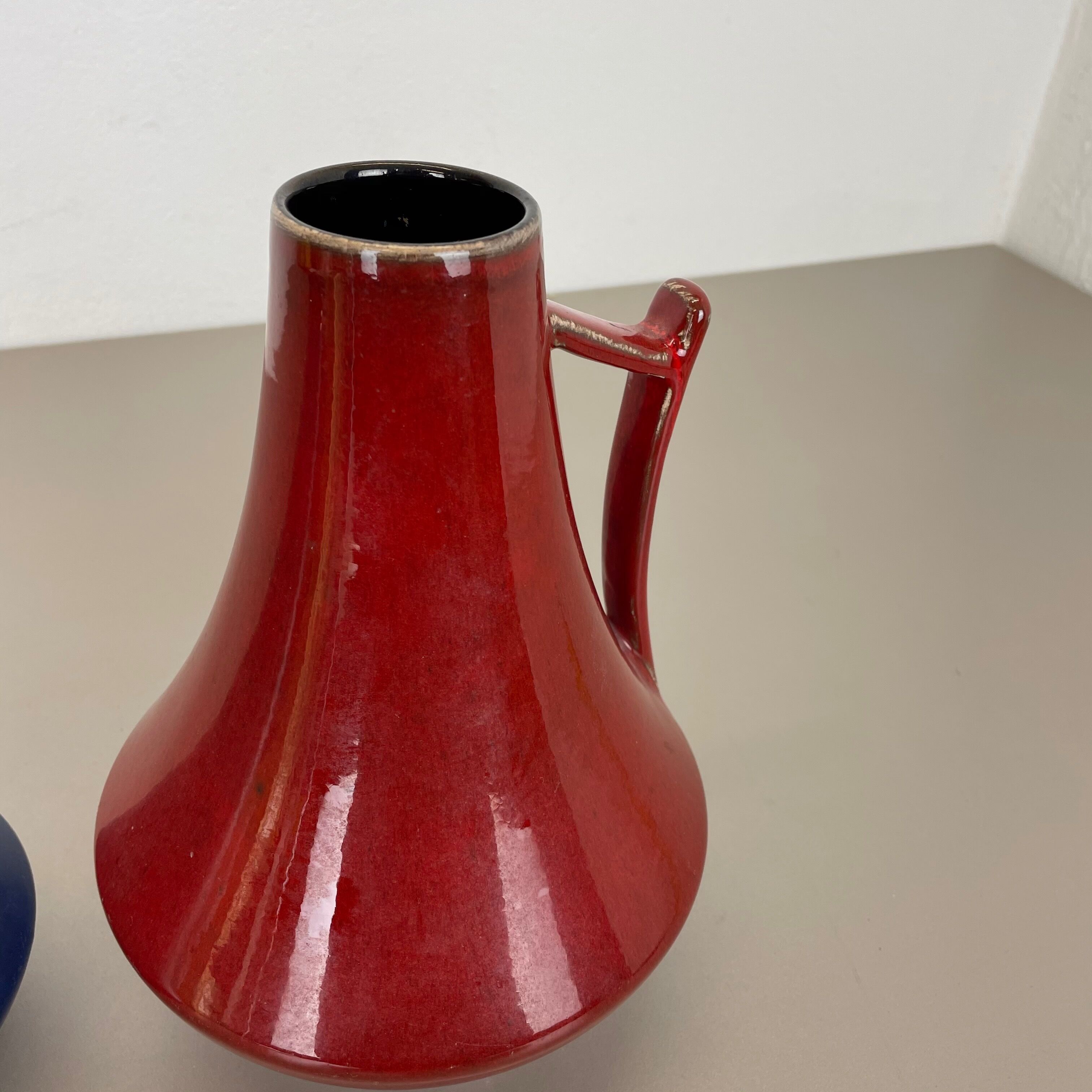 Set of two pottery fat lava vases "black-red" by Jopeko, Germany, 1970s modern