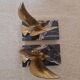 Pair of golden bird bookends on veined marble – Mid-Century vintage