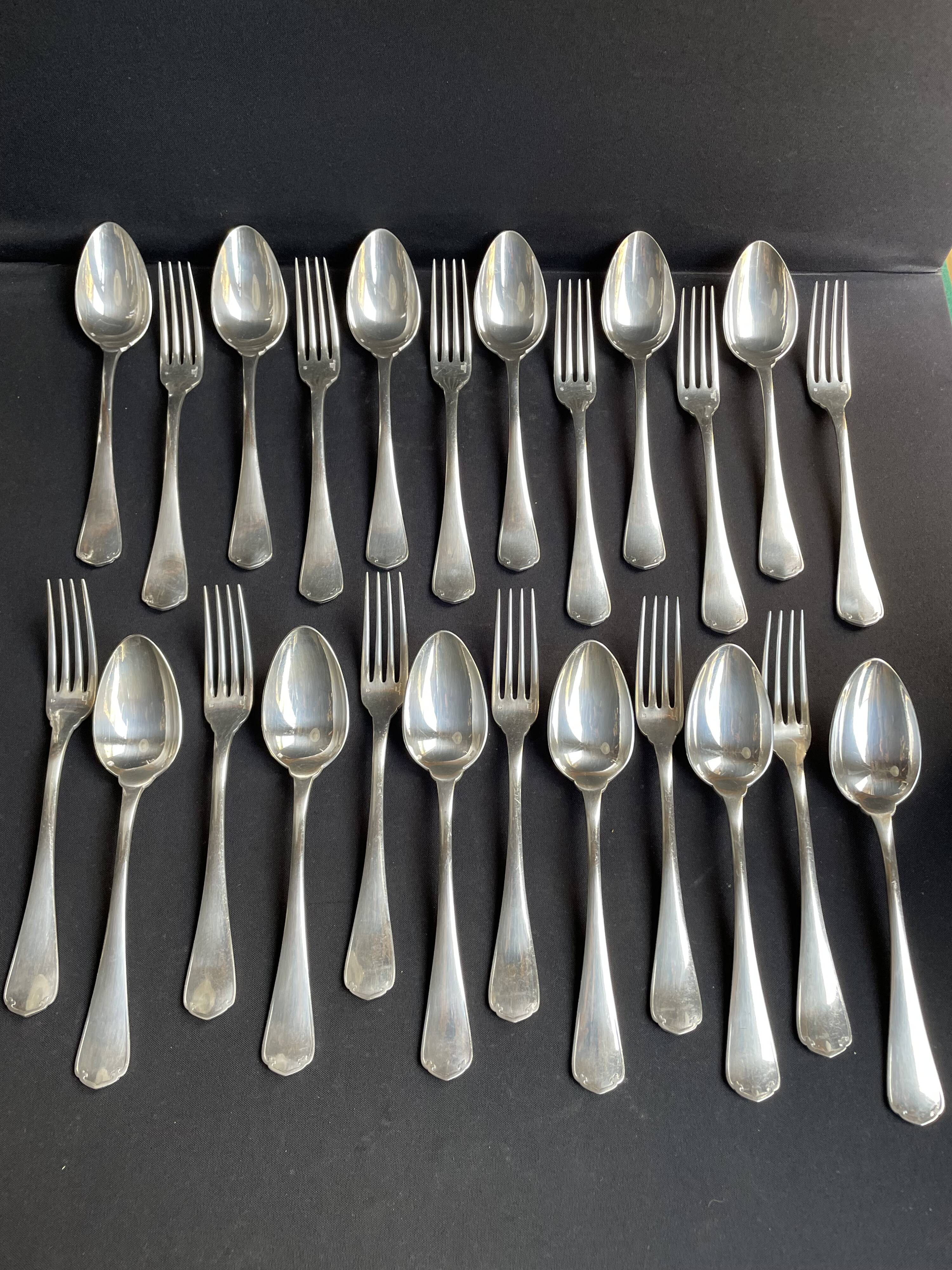 12 Christofle table forks and 12 spoons
