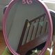 Vintage pink oval cast iron mirror