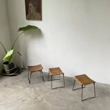 Set of three Raoul Guys wicker and metal stools