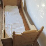 Retractable sofa bed of the Austrian Tyrole in natural wood