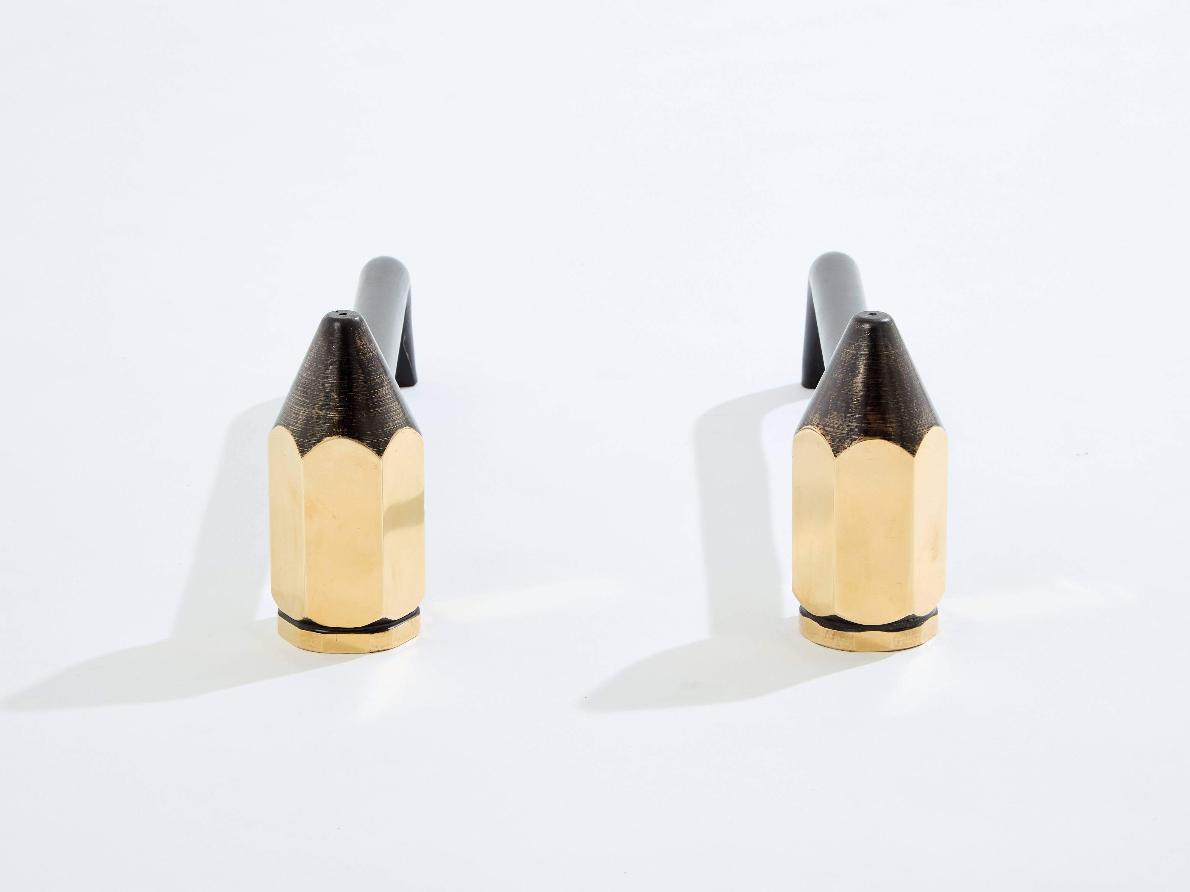 Pair of pencil andirons in brass and wrought iron circa 1960