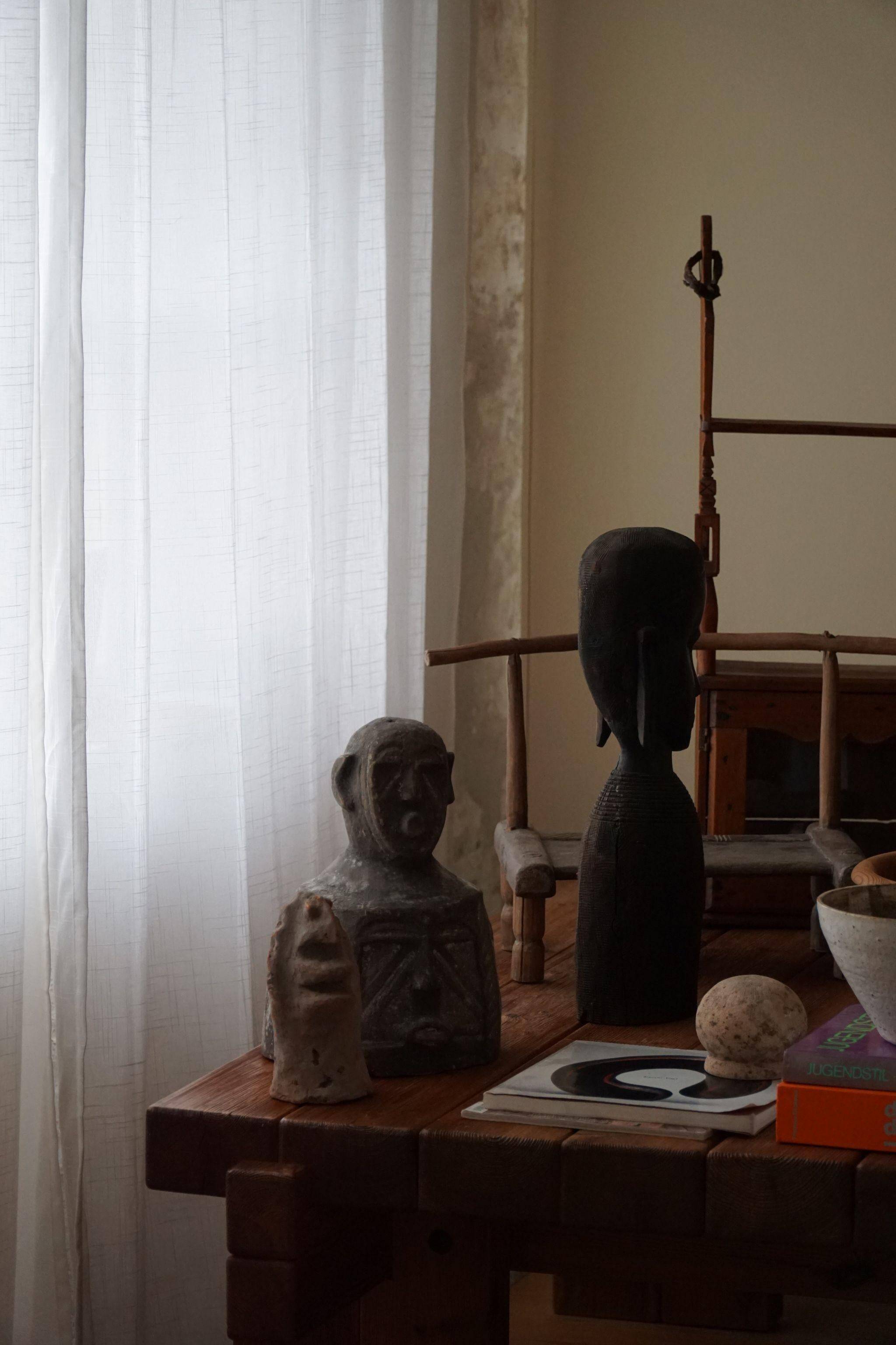 Mid-century decorative African wooden sculpture, made in the 1940s-50s.