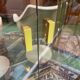 Exhibition showcase in gold-plated chrome and smoked glass - work from the 1980s.