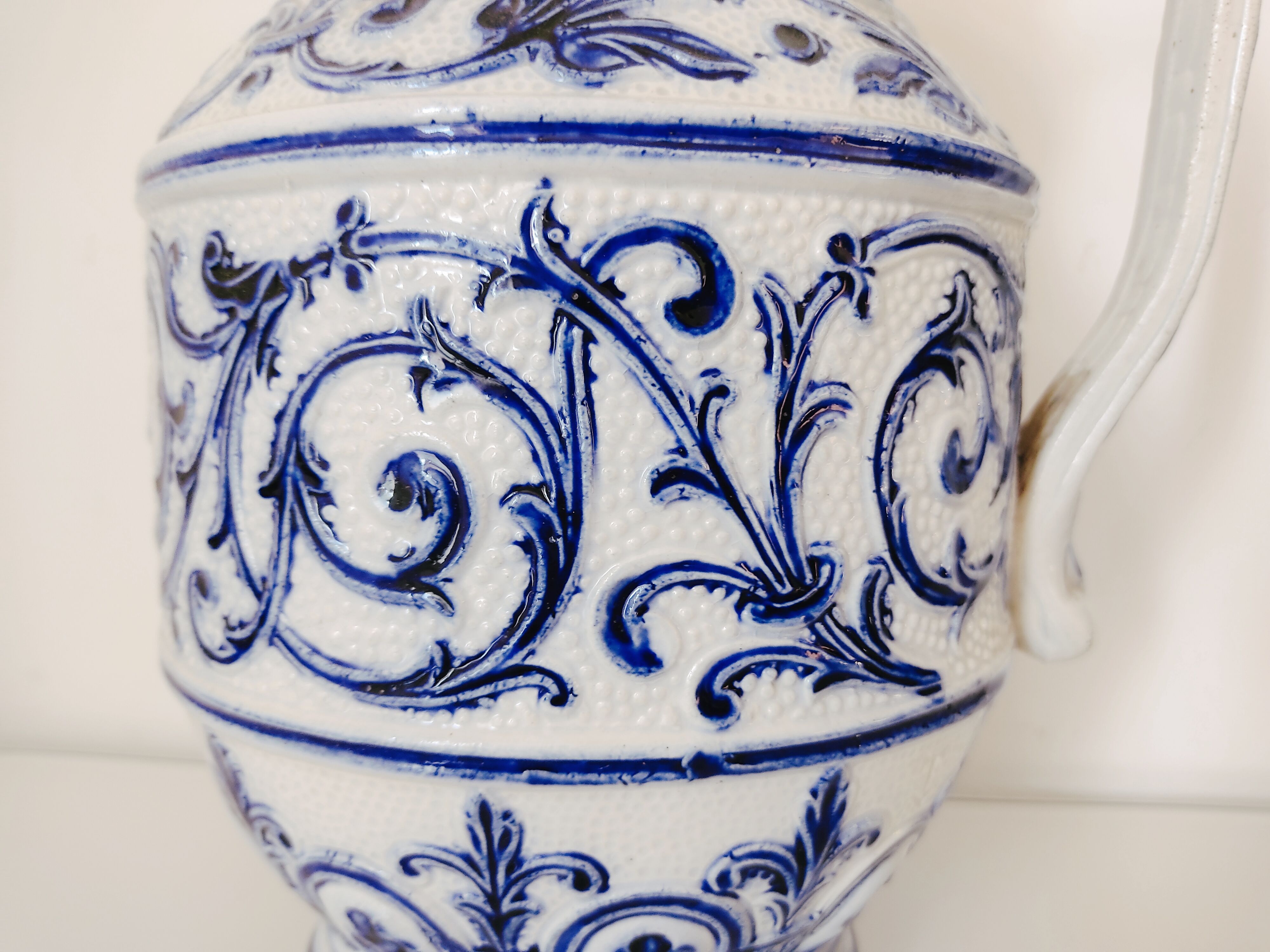 Blue and white pitcher