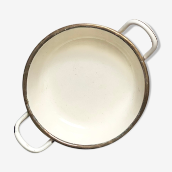 Old egg dish in creamy white and golden enamelled sheet