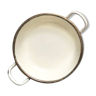 Old egg dish in creamy white and golden enamelled sheet