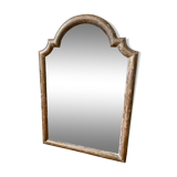 Patinated gilded mirror in wood and plaster