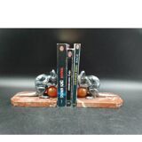 Antique Art Deco bookends in silver-plated metal, bakelite, and marble, signed H. M.