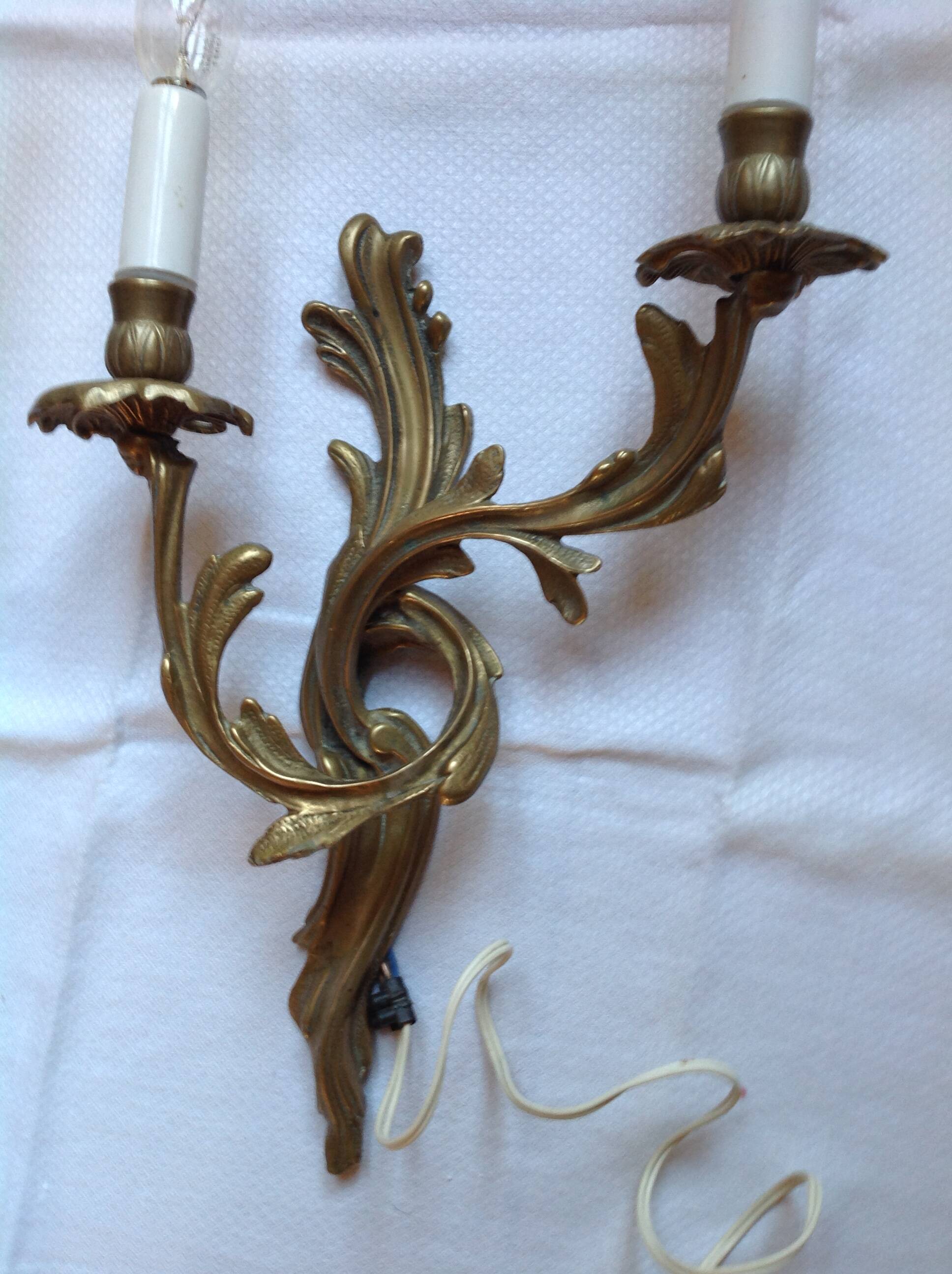 Pair of antique bronze wall lights, early 20th century