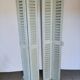 Louvered wooden shutter