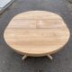Scandinavian Baumann round extendable dining table with central leg, 115cm.