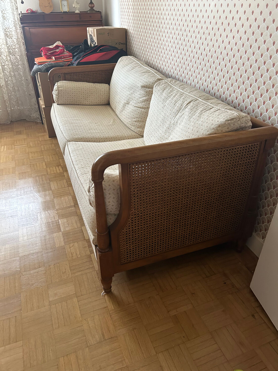 Vintage convertible wooden and cane sofa