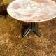 Two metal garden tables make up