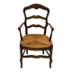 Provencal style straw armchair sometimes called marsh armchair