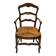 Provencal style straw armchair sometimes called marsh armchair