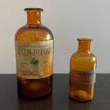 Lot of old glass perfumer bottles with original labels