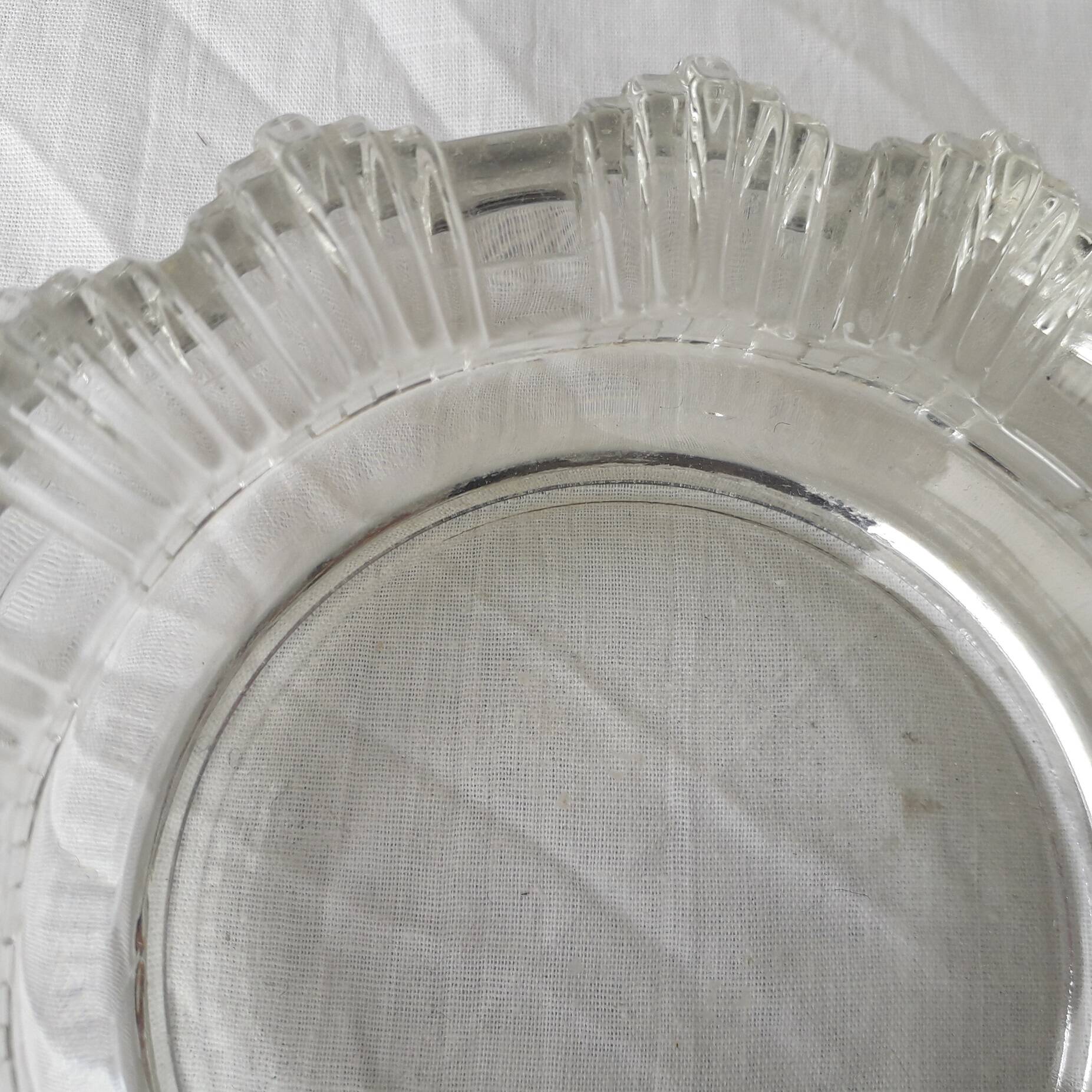 Ashtray or glass catchall.