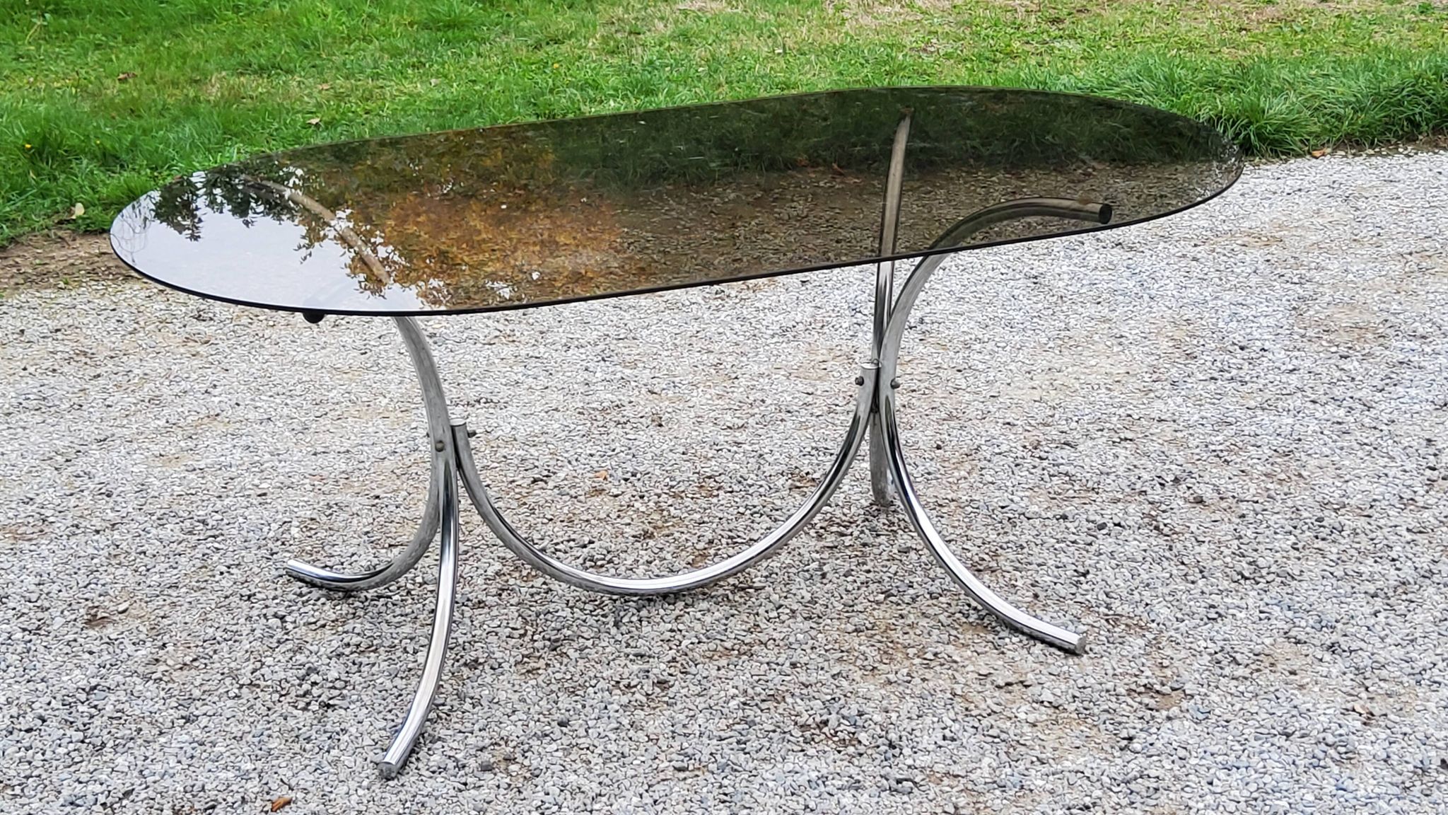 Dining table from the 70s top smoked glass base chrome