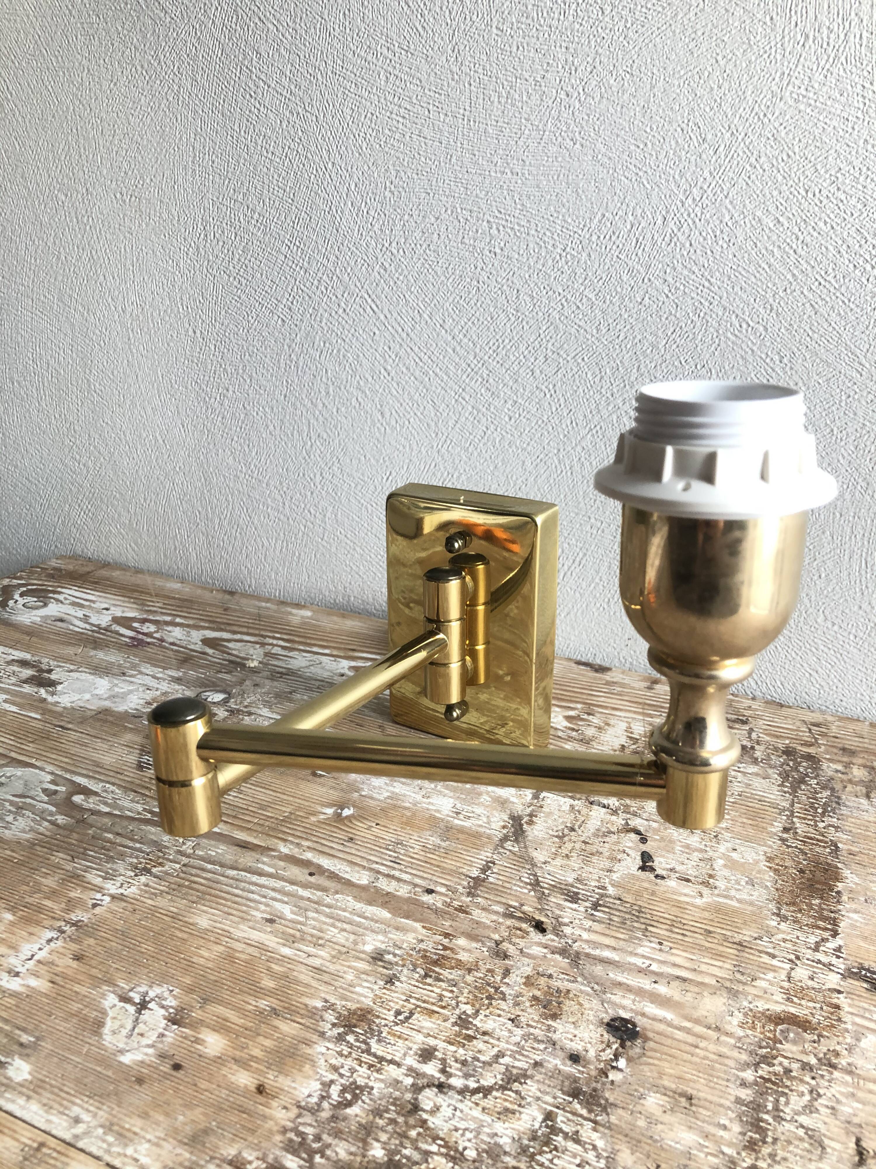 Deschuytener brass articulated wall lamp