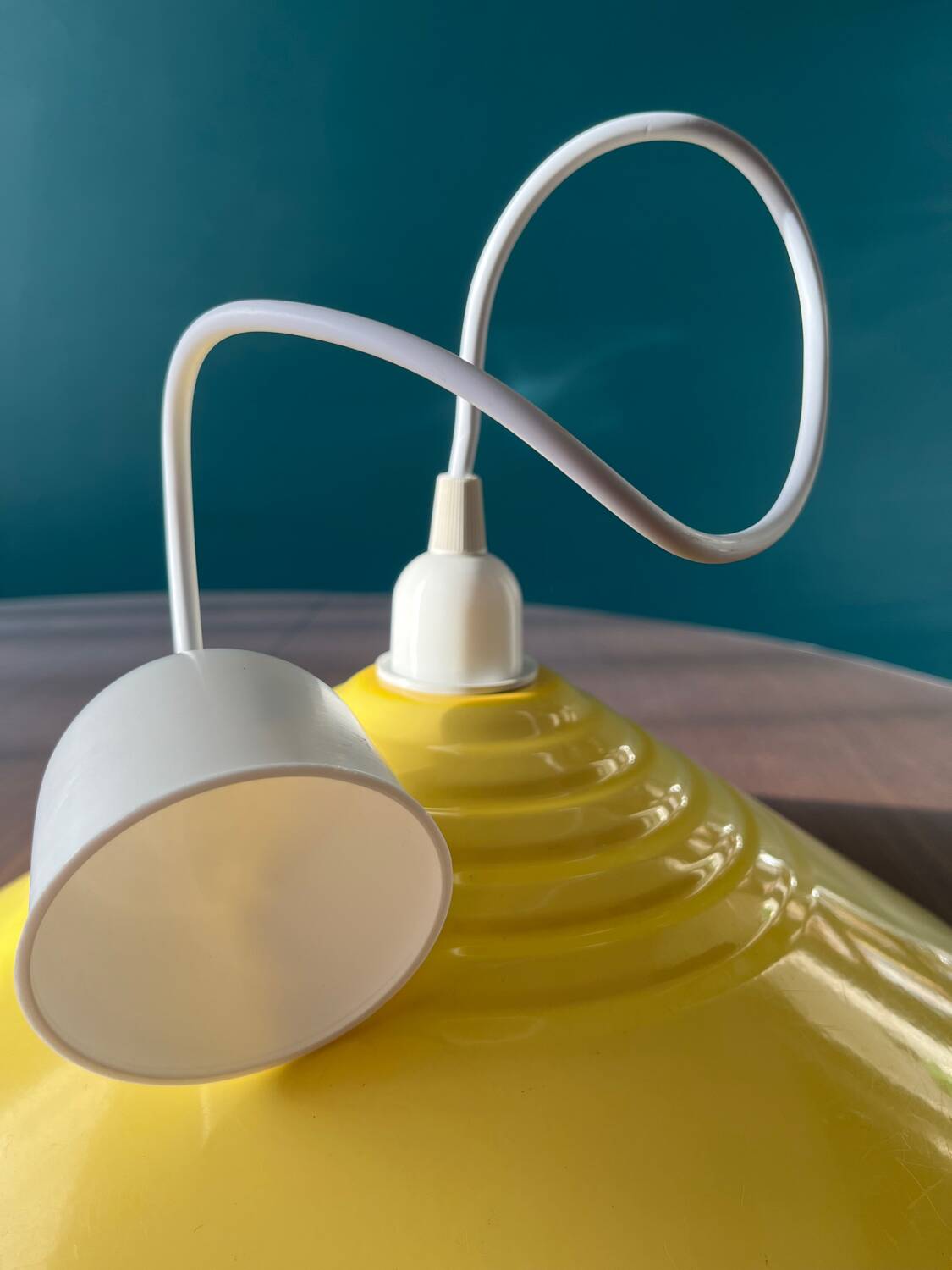 Yellow metal pendant light from the 80s