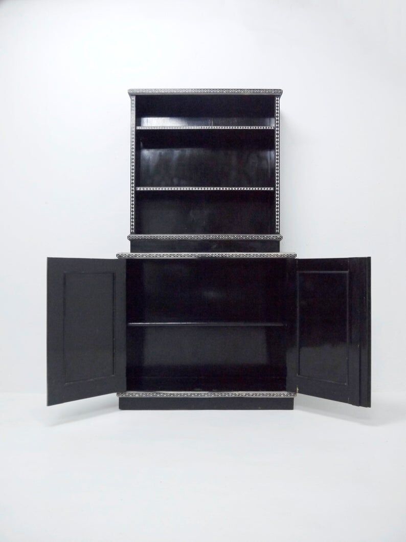 Antique wooden cabinet painted in black and with incised white painted decorations, Ettore Zaccari, Italy c 1910