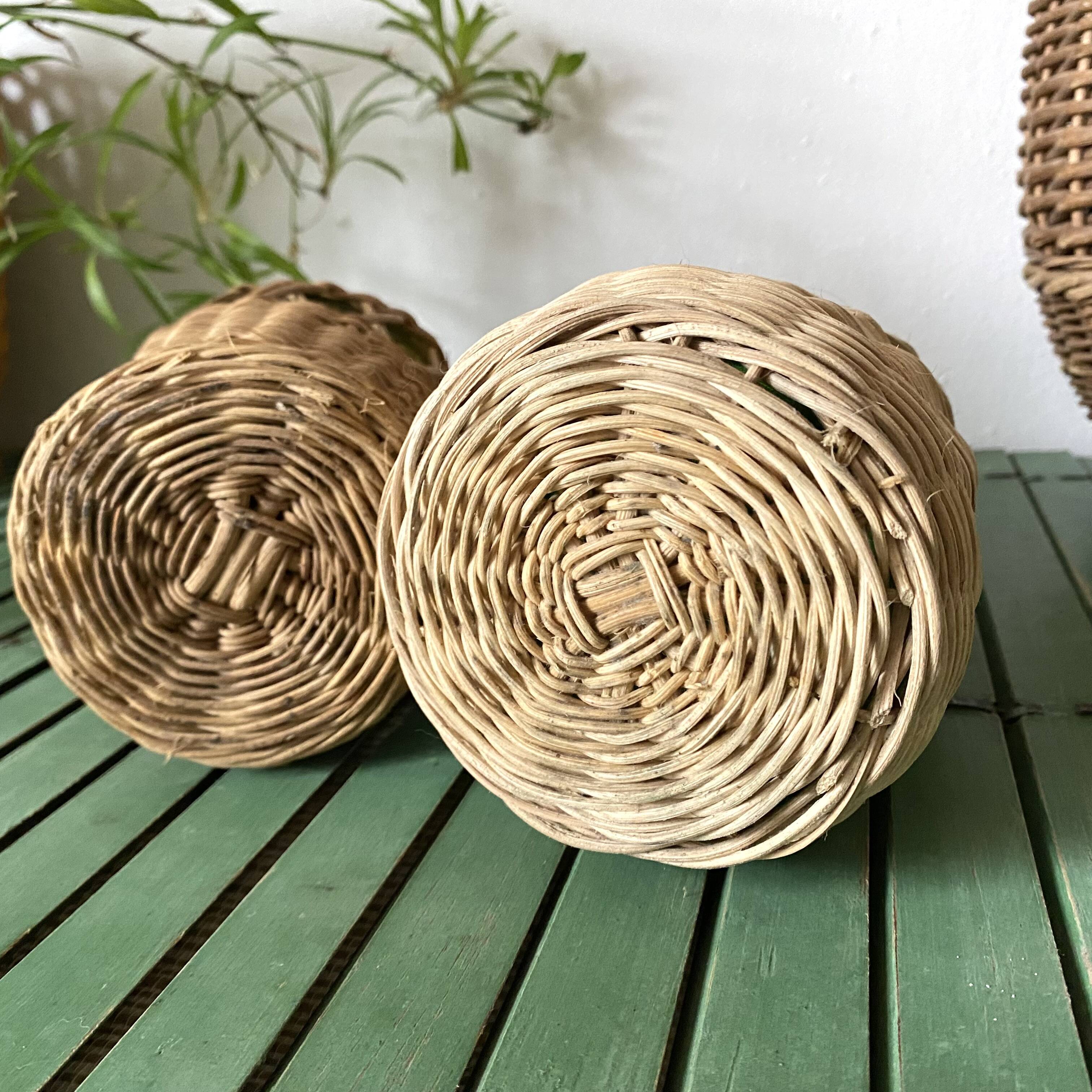 Glass bottles and woven rattan